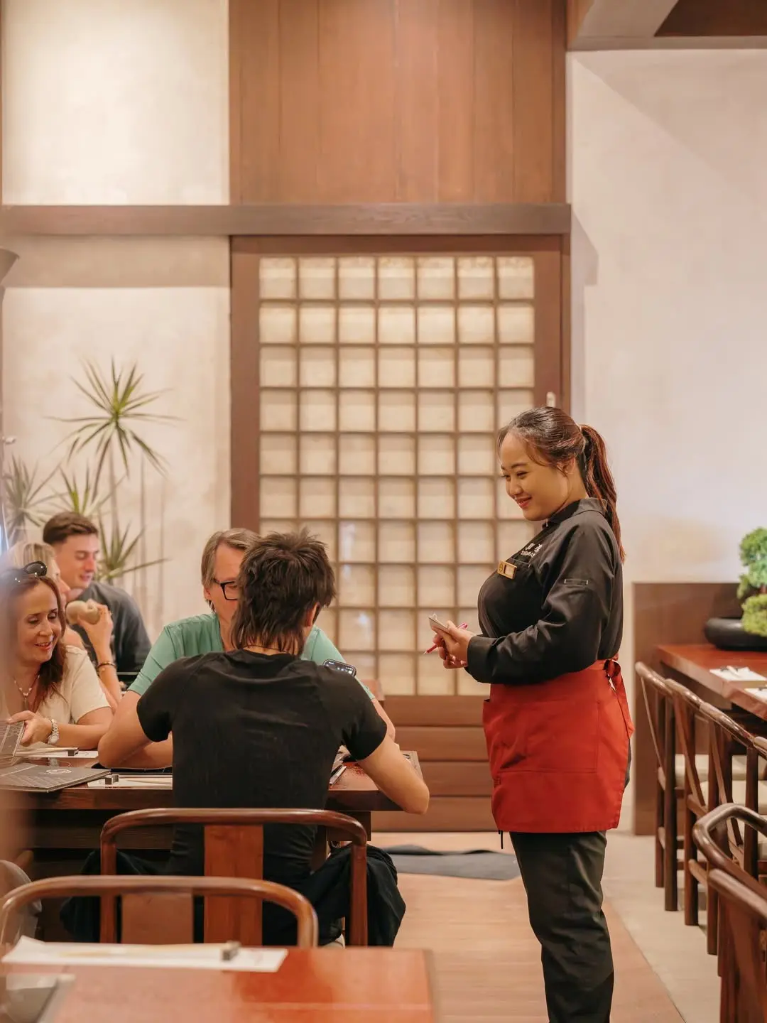 Sophisticated Japanese dining atmosphere with attentive culinary service in Ubud