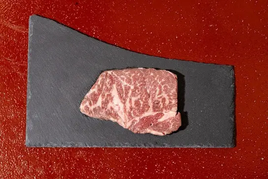Tokusen Chuckroll premium beef cut with marbling for Japanese grilling at Shinraku Ubud