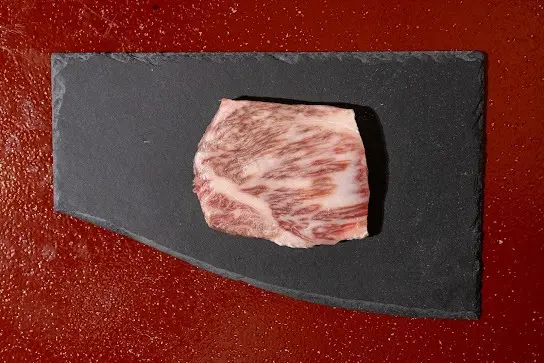 Omi Wagyu A5 premium beef cut with rich marbling for Japanese teppanyaki at Shinraku Ubud
