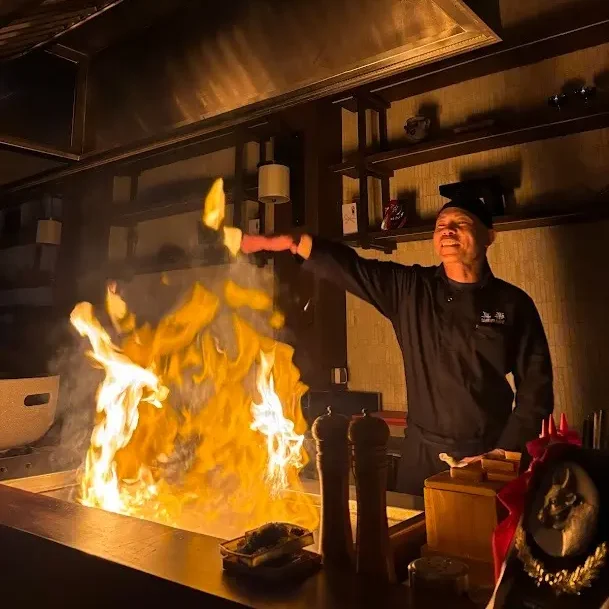 Romantic trip in Bali at Shinraku Teppanyaki. Enjoy the sizzling fire, chef's mastery, and juicy & tender grilled beef.